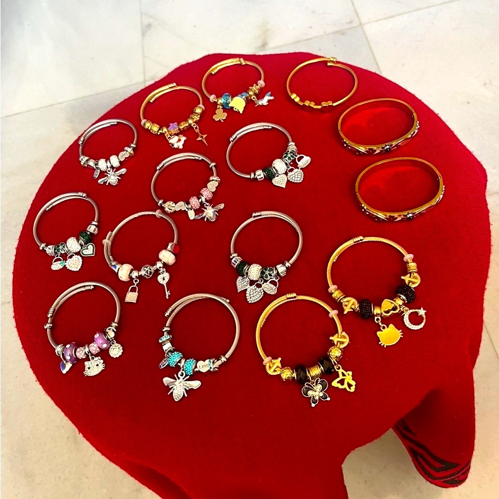 Elegant Gold and Silver Charm Bracelets